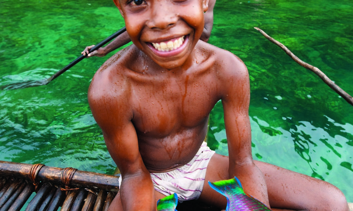 Boy with fishing catch, Tufi