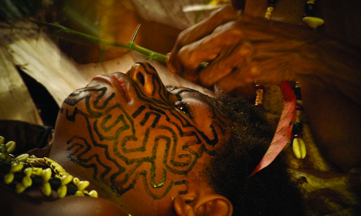 Receiving the face tattoo, Tufi