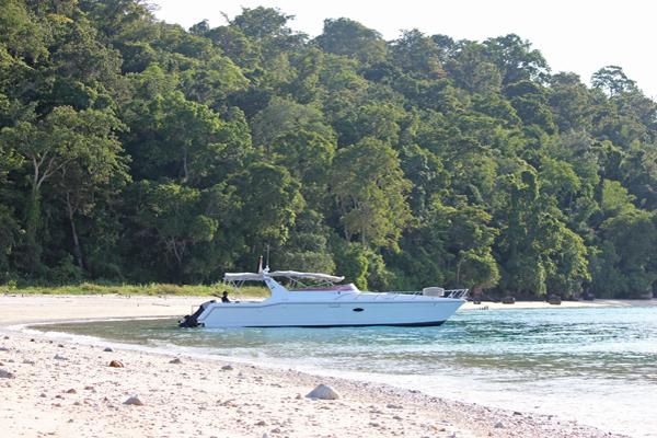 Resort boat on nearby beach