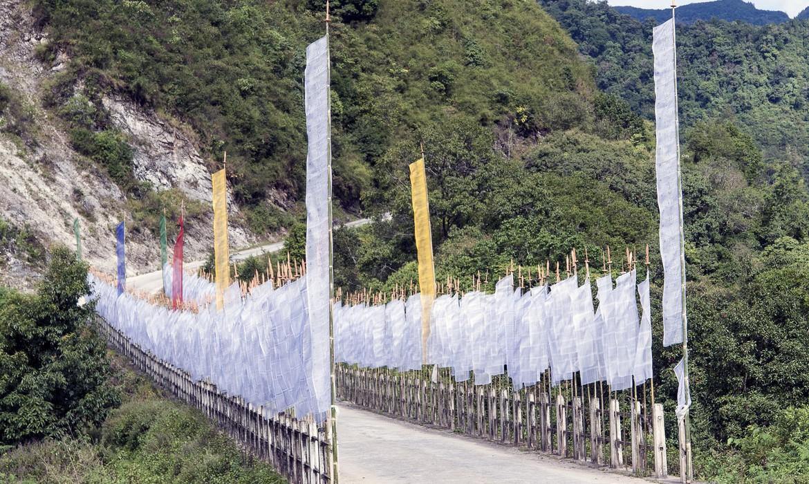 Buddhist Prayer Flags on a road bridge, Trashigang