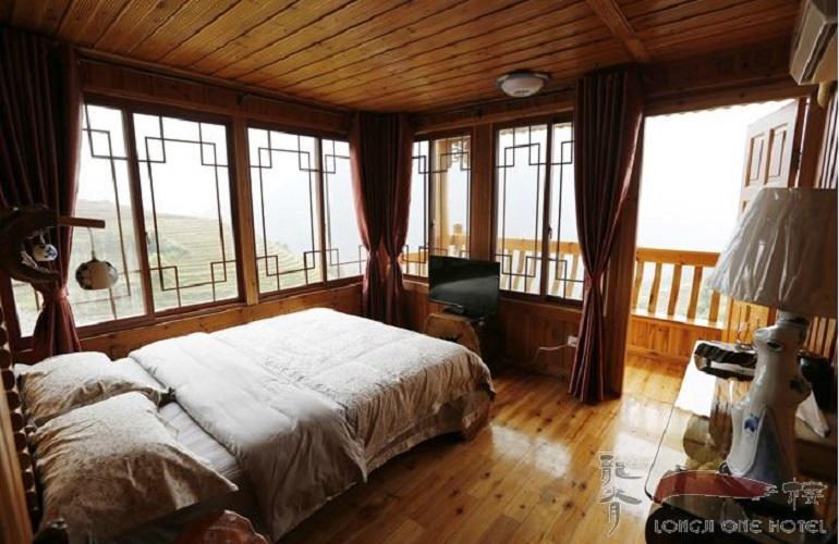 Bedroom with balcony, Longji One Hotel